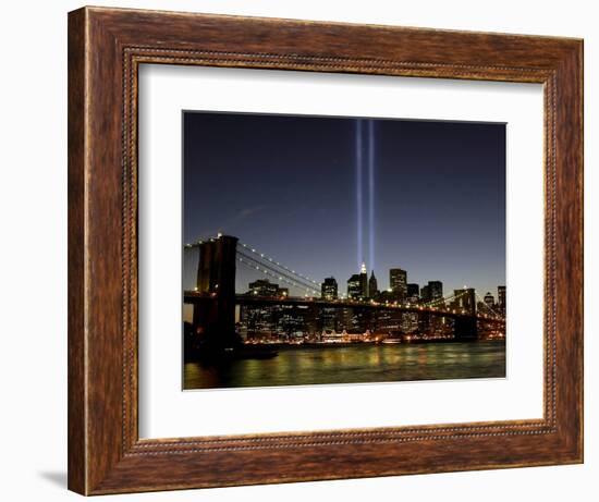 The Tribute of Light Memorial Shines into the Sky Over the Night Skyline of New York City-null-Framed Photographic Print