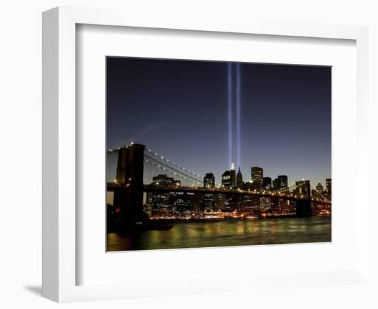 The Tribute of Light Memorial Shines into the Sky Over the Night Skyline of New York City-null-Framed Photographic Print