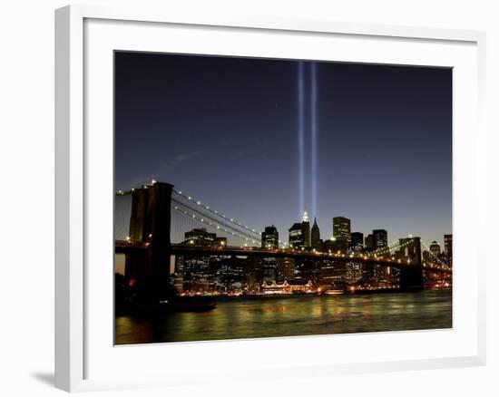 The Tribute of Light Memorial Shines into the Sky Over the Night Skyline of New York City-null-Framed Photographic Print