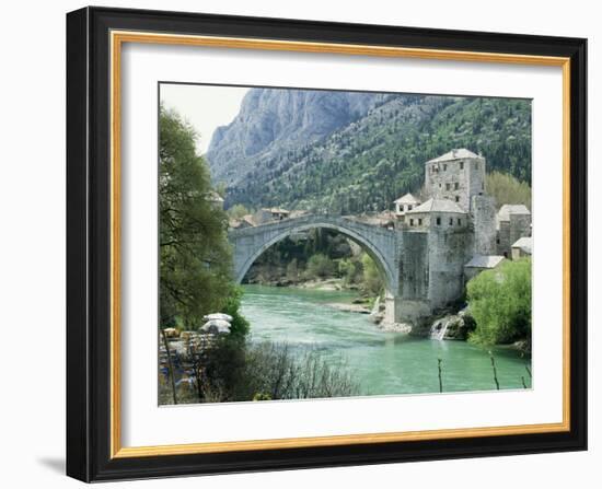 The Turkish Bridge Over the River Neretva Dividing the Town, Mostar, Bosnia, Bosnia-Herzegovina-Michael Short-Framed Photographic Print