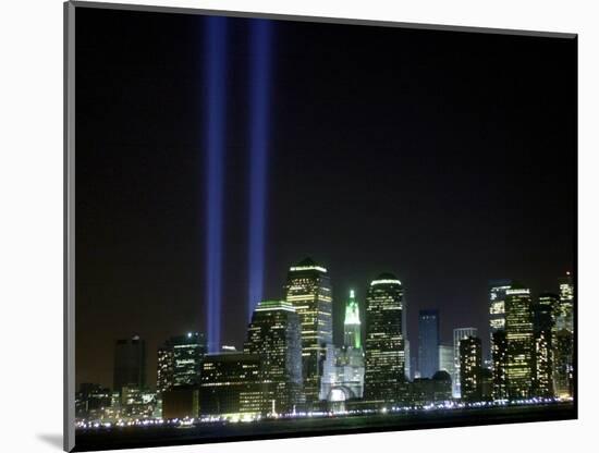The Twin Lights Memorial Rises Above the New York City Skyline from the Waterfront-null-Mounted Photographic Print