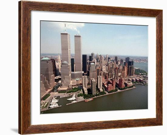 The Twin Towers of the World Trade Center Rise Above the New York Skyline-null-Framed Photographic Print