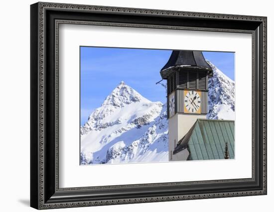 The typical alpine bell tower frames the snowy peaks, Langwies, district of Plessur, Canton of Grau-Roberto Moiola-Framed Photographic Print