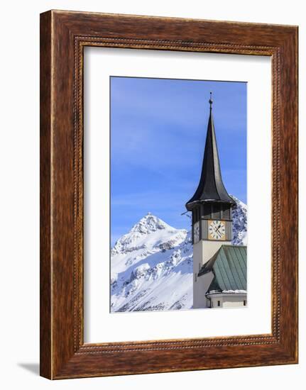 The typical alpine bell tower frames the snowy peaks, Langwies, district of Plessur, Canton of Grau-Roberto Moiola-Framed Photographic Print