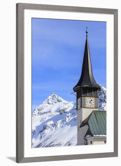 The typical alpine bell tower frames the snowy peaks, Langwies, district of Plessur, Canton of Grau-Roberto Moiola-Framed Photographic Print