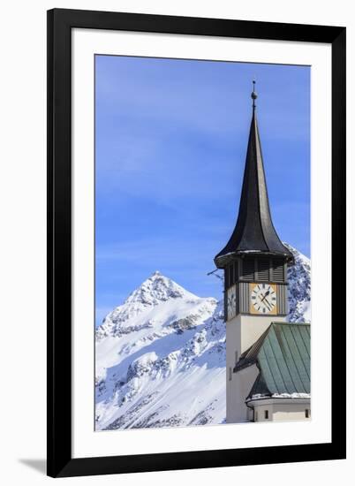 The typical alpine bell tower frames the snowy peaks, Langwies, district of Plessur, Canton of Grau-Roberto Moiola-Framed Photographic Print
