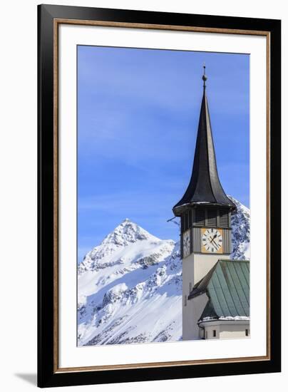 The typical alpine bell tower frames the snowy peaks, Langwies, district of Plessur, Canton of Grau-Roberto Moiola-Framed Photographic Print