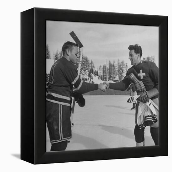 The Usa Team Giving the Swiss a Sweater and a Friendly Handshake before the Game-Mark Kauffman-Framed Premier Image Canvas