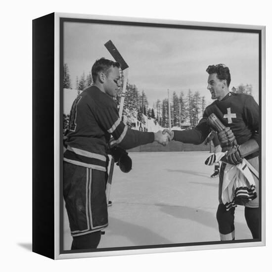 The Usa Team Giving the Swiss a Sweater and a Friendly Handshake before the Game-Mark Kauffman-Framed Premier Image Canvas