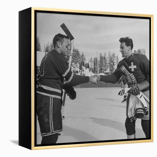 The Usa Team Giving the Swiss a Sweater and a Friendly Handshake before the Game-Mark Kauffman-Framed Premier Image Canvas