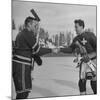 The Usa Team Giving the Swiss a Sweater and a Friendly Handshake before the Game-Mark Kauffman-Mounted Premium Photographic Print