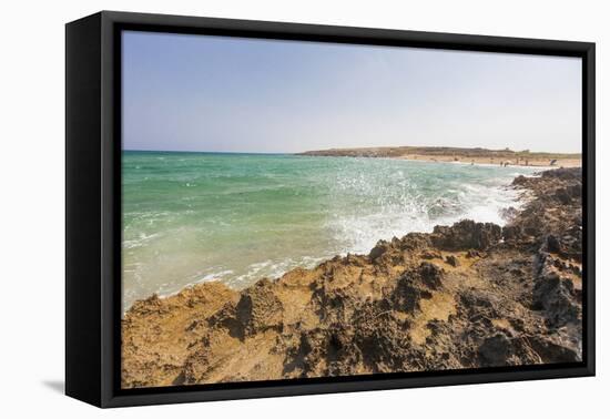 The waves of turquoise sea crashing on the rocks, Pozzallo, Province of Ragusa, Sicily, Italy, Medi-Roberto Moiola-Framed Premier Image Canvas