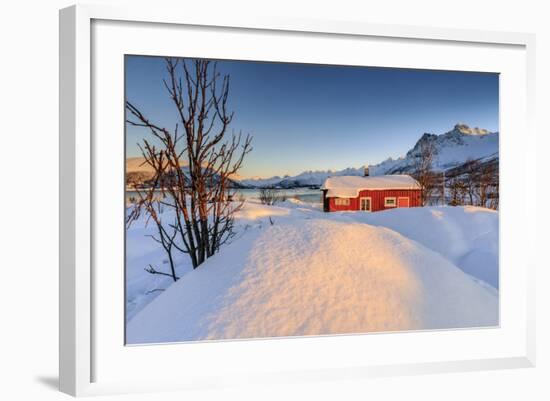 The Winter Sun Illuminates a Typical Norwegian Red House Surrounded by Fresh Snow-Roberto Moiola-Framed Photographic Print