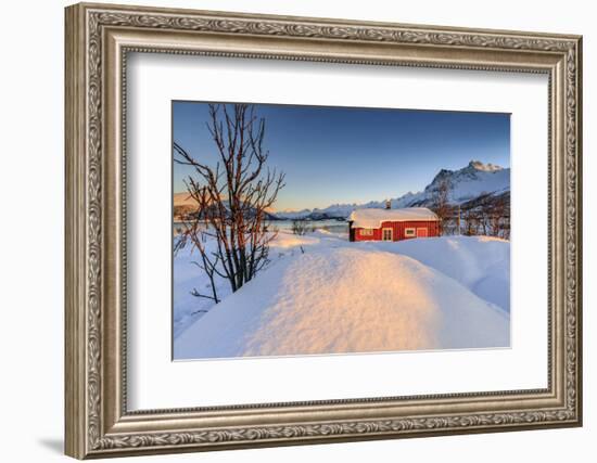 The Winter Sun Illuminates a Typical Norwegian Red House Surrounded by Fresh Snow-Roberto Moiola-Framed Photographic Print