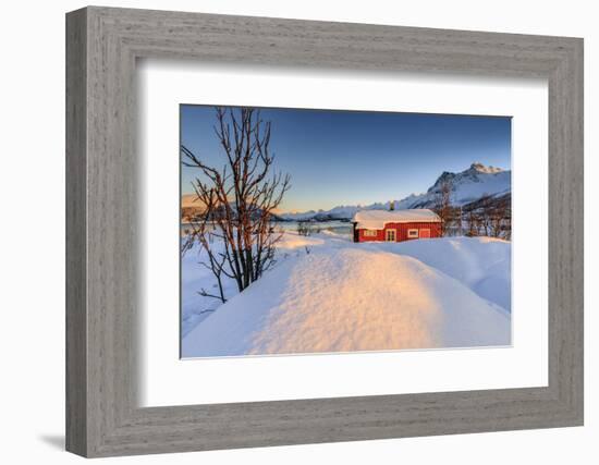 The Winter Sun Illuminates a Typical Norwegian Red House Surrounded by Fresh Snow-Roberto Moiola-Framed Photographic Print