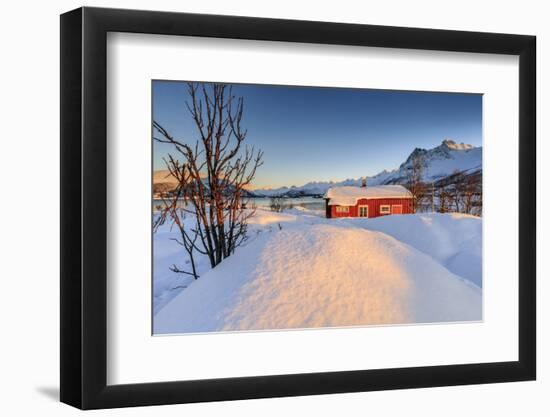 The Winter Sun Illuminates a Typical Norwegian Red House Surrounded by Fresh Snow-Roberto Moiola-Framed Photographic Print