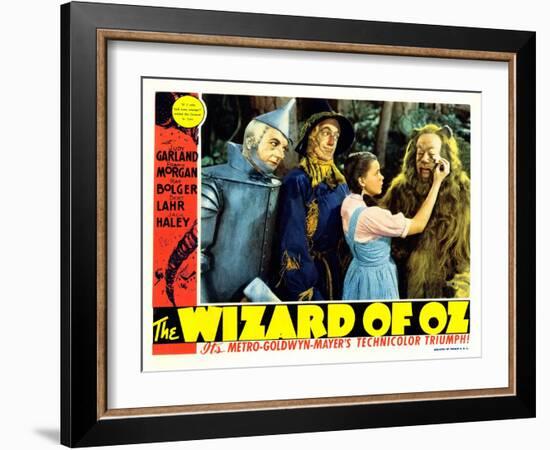 The Wizard of Oz, from Left: Jack Haley, Ray Bolger, Judy Garland, Bert Lahr, 1939-null-Framed Art Print