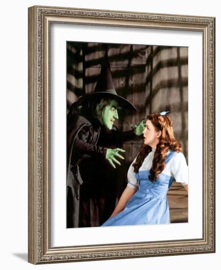 The Wizard of Oz, Margaret Hamilton, Judy Garland, 1939-null-Framed Premium Photographic Print