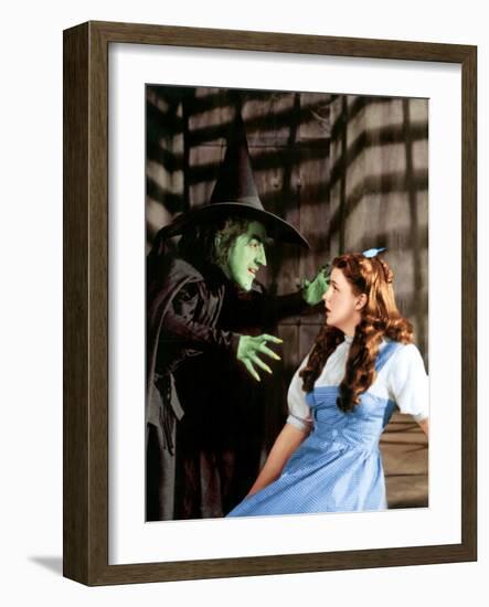 The Wizard of Oz, Margaret Hamilton, Judy Garland, 1939-null-Framed Premium Photographic Print