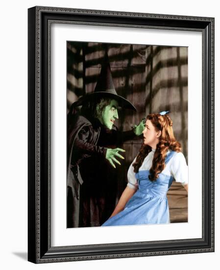 The Wizard of Oz, Margaret Hamilton, Judy Garland, 1939-null-Framed Premium Photographic Print