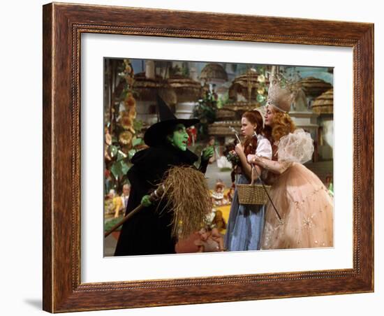 The Wizard of Oz, Margaret Hamilton, Judy Garland, Billie Burke, 1939-null-Framed Premium Photographic Print