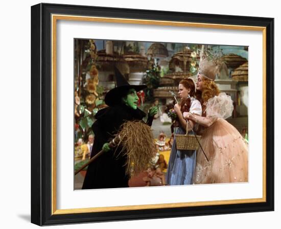 The Wizard of Oz, Margaret Hamilton, Judy Garland, Billie Burke, 1939-null-Framed Premium Photographic Print