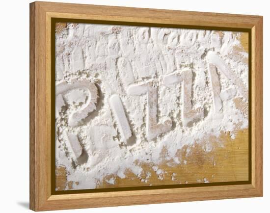 The Word 'PIZZA' Written in Flour-Yehia Asem El Alaily-Framed Premier Image Canvas