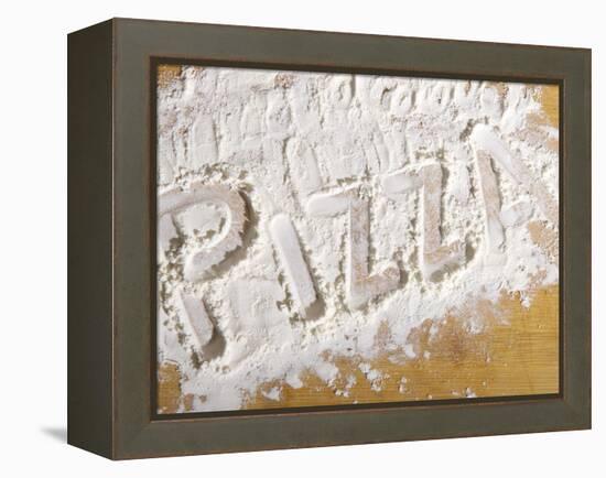 The Word 'PIZZA' Written in Flour-Yehia Asem El Alaily-Framed Premier Image Canvas