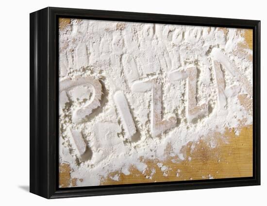 The Word 'PIZZA' Written in Flour-Yehia Asem El Alaily-Framed Premier Image Canvas