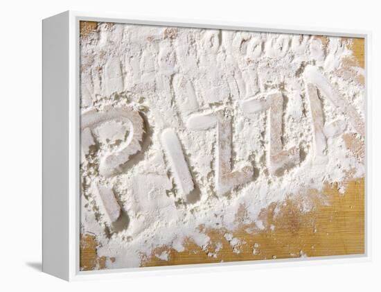 The Word 'PIZZA' Written in Flour-Yehia Asem El Alaily-Framed Premier Image Canvas