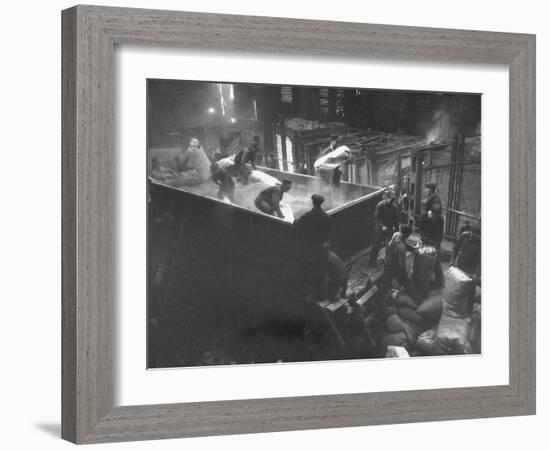 The Workmen Quickly Covering the Ingot with Vermiculite-Ralph Morse-Framed Photographic Print