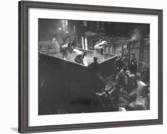 The Workmen Quickly Covering the Ingot with Vermiculite-Ralph Morse-Framed Photographic Print