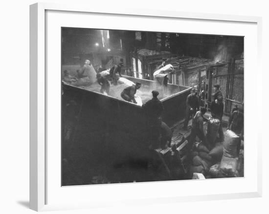 The Workmen Quickly Covering the Ingot with Vermiculite-Ralph Morse-Framed Photographic Print