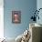 The World-Linda Benton-Framed Premier Image Canvas displayed on a wall