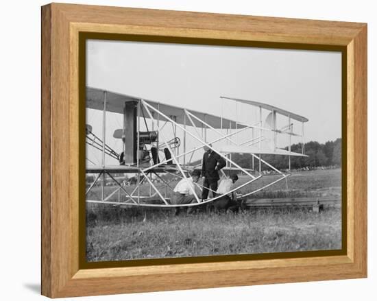 The Wright Brothers put a plane on the launch rail for the first Army flight at Fort Myer-Harris & Ewing-Framed Premier Image Canvas