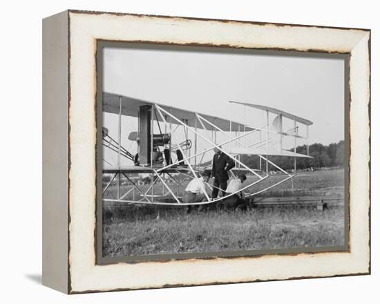 The Wright Brothers put a plane on the launch rail for the first Army flight at Fort Myer-Harris & Ewing-Framed Premier Image Canvas