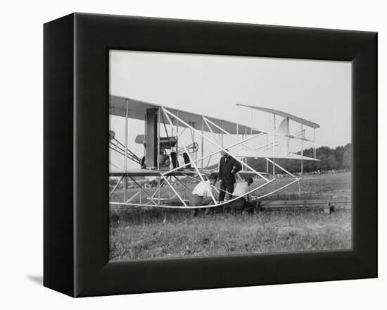 The Wright Brothers put a plane on the launch rail for the first Army flight at Fort Myer-Harris & Ewing-Framed Premier Image Canvas