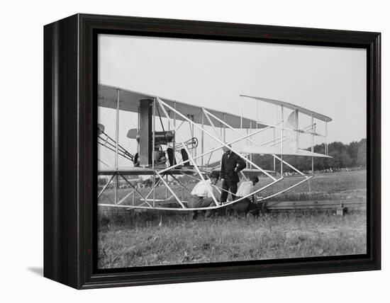 The Wright Brothers put a plane on the launch rail for the first Army flight at Fort Myer-Harris & Ewing-Framed Premier Image Canvas