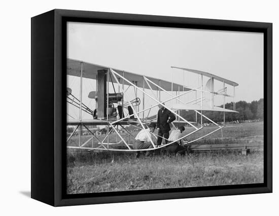 The Wright Brothers put a plane on the launch rail for the first Army flight at Fort Myer-Harris & Ewing-Framed Premier Image Canvas