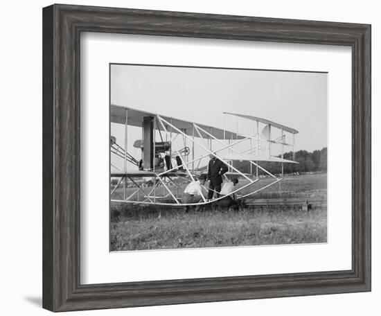 The Wright Brothers put a plane on the launch rail for the first Army flight at Fort Myer-Harris & Ewing-Framed Photographic Print