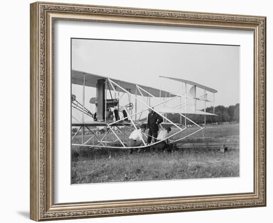 The Wright Brothers put a plane on the launch rail for the first Army flight at Fort Myer-Harris & Ewing-Framed Photographic Print