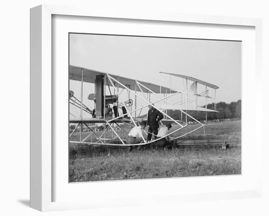 The Wright Brothers put a plane on the launch rail for the first Army flight at Fort Myer-Harris & Ewing-Framed Photographic Print