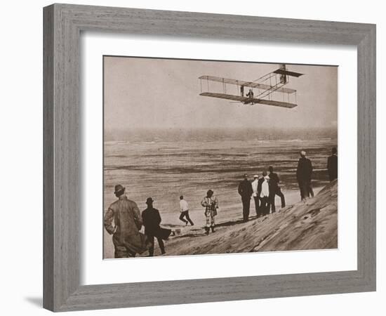 The Wright Brothers Testing an Early Plane at Kitty Hawk, North Carolina-null-Framed Photographic Print