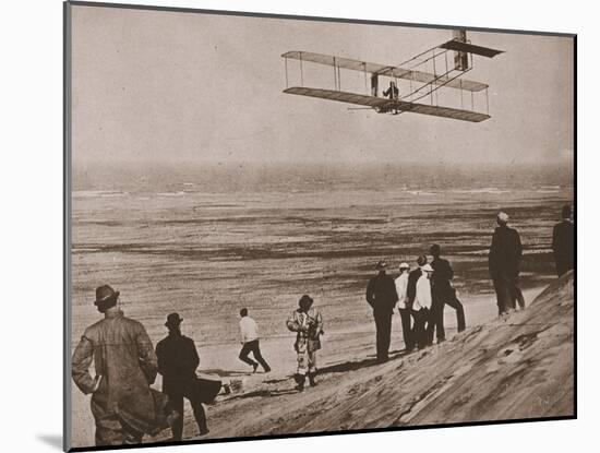 The Wright Brothers Testing an Early Plane at Kitty Hawk, North Carolina-null-Mounted Photographic Print