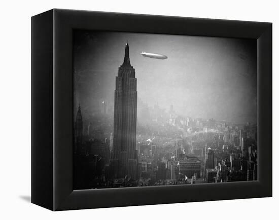 The Zeppelin Hindenburg Floats Past the Empire State Building-null-Framed Premier Image Canvas