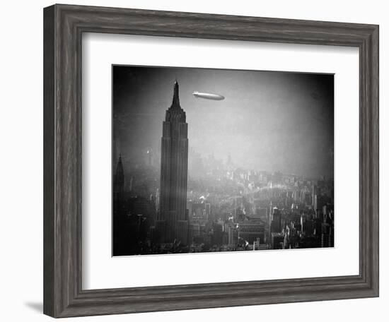 The Zeppelin Hindenburg Floats Past the Empire State Building-null-Framed Photographic Print