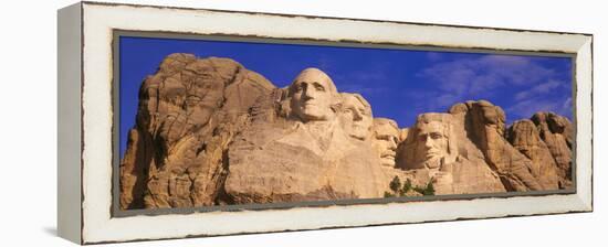 This Is a Close Up View of Mount Rushmore National Monument Against a Blue Sky-null-Framed Stretched Canvas