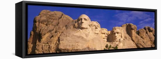 This Is a Close Up View of Mount Rushmore National Monument Against a Blue Sky-null-Framed Stretched Canvas