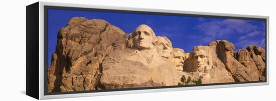 This Is a Close Up View of Mount Rushmore National Monument Against a Blue Sky-null-Framed Stretched Canvas