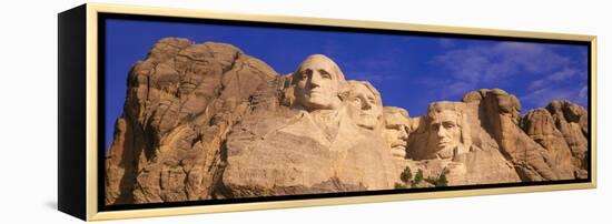 This Is a Close Up View of Mount Rushmore National Monument Against a Blue Sky-null-Framed Stretched Canvas